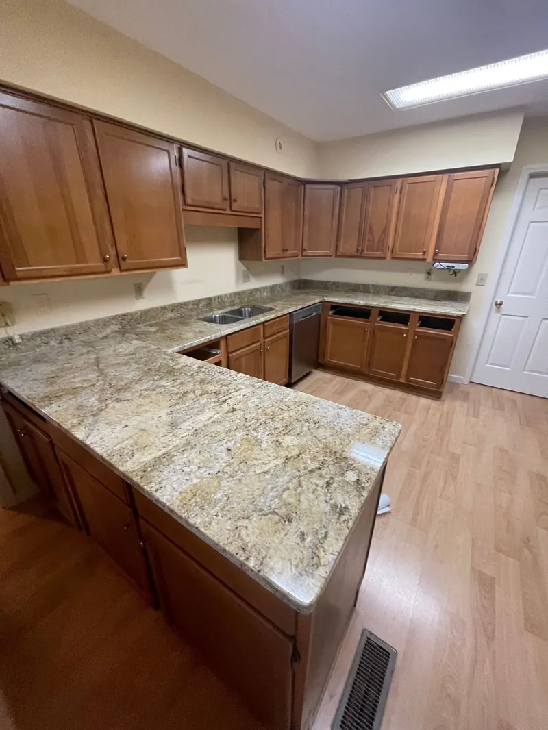 Twins Granite crew fabricating a granite countertop